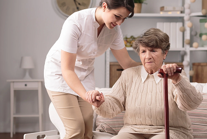 Girl Assisting Elderly Woman